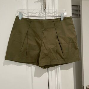 Tory Burch Mini Shorts. Army green with side zip and pockets. Gently used